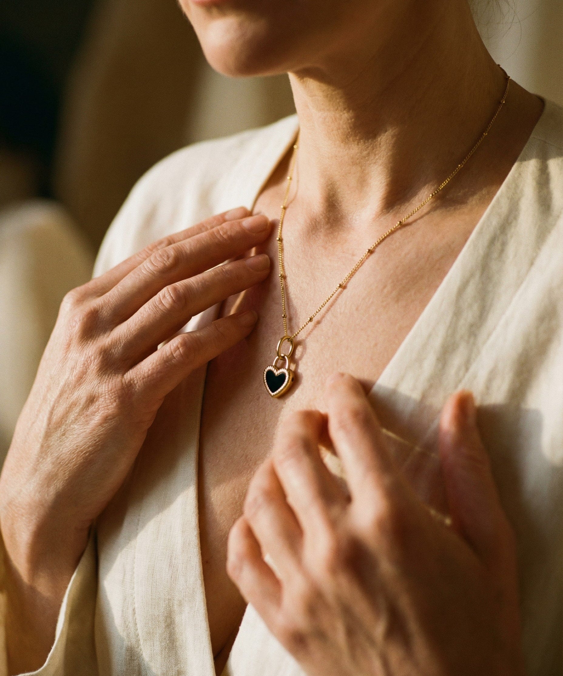 Black and White Gold Heart Pendant Necklace