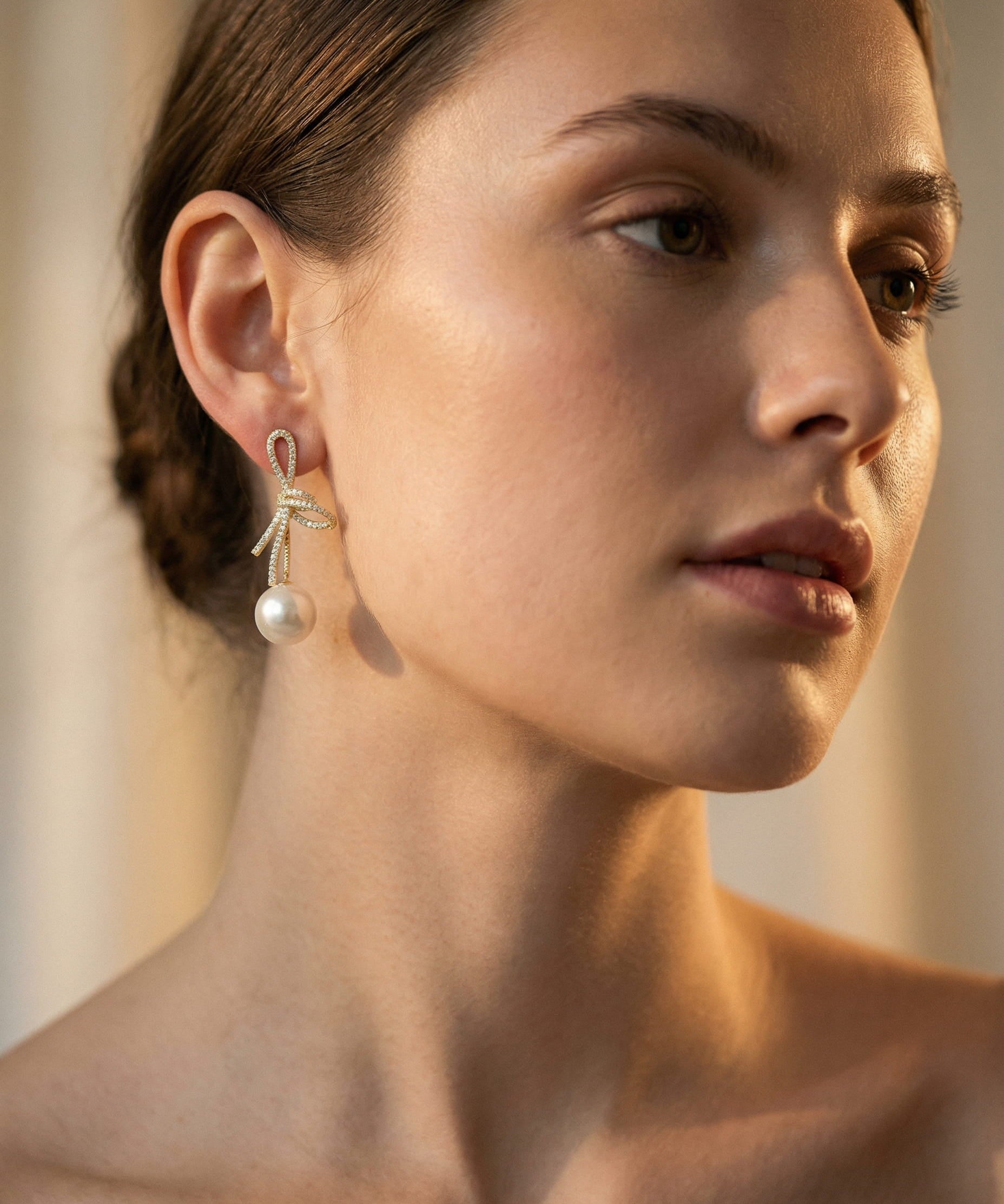 Gold Sparkling Bow Pearl Earrings