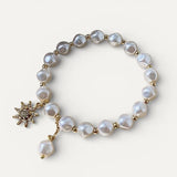 White Gold, Pearl and Sunflower Charm Bracelet